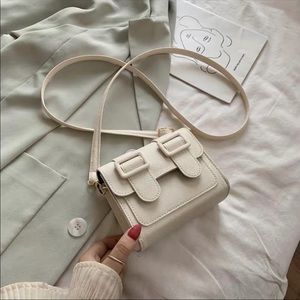 Mini bag with strap on sale